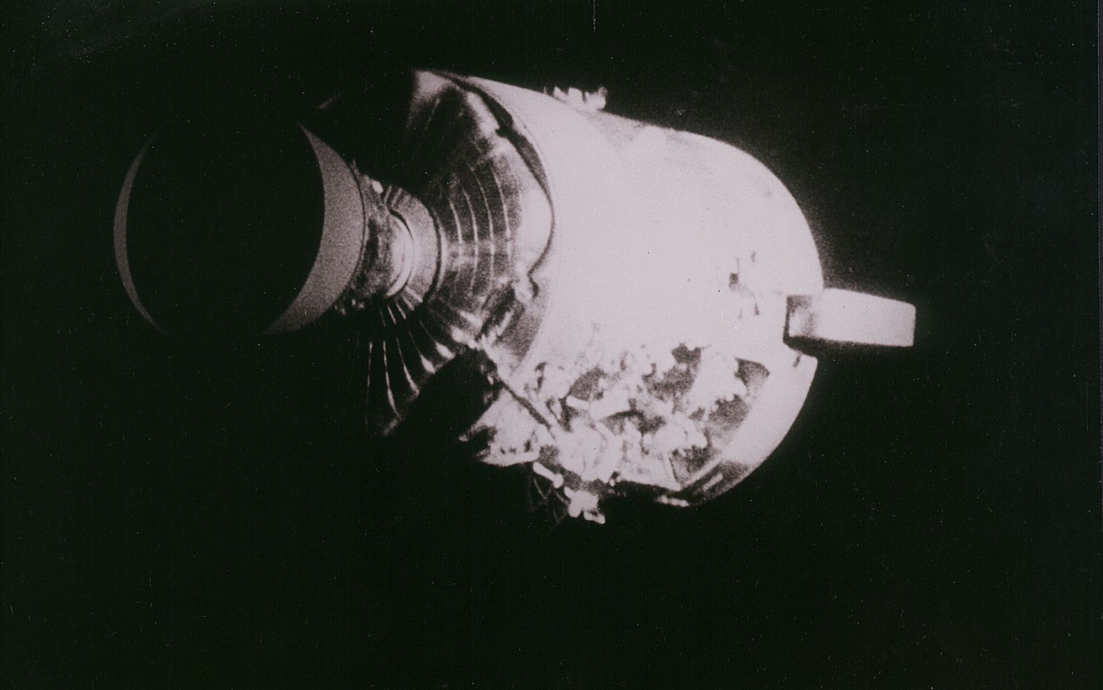 The Apollo 13 service module with a whole panel blown away