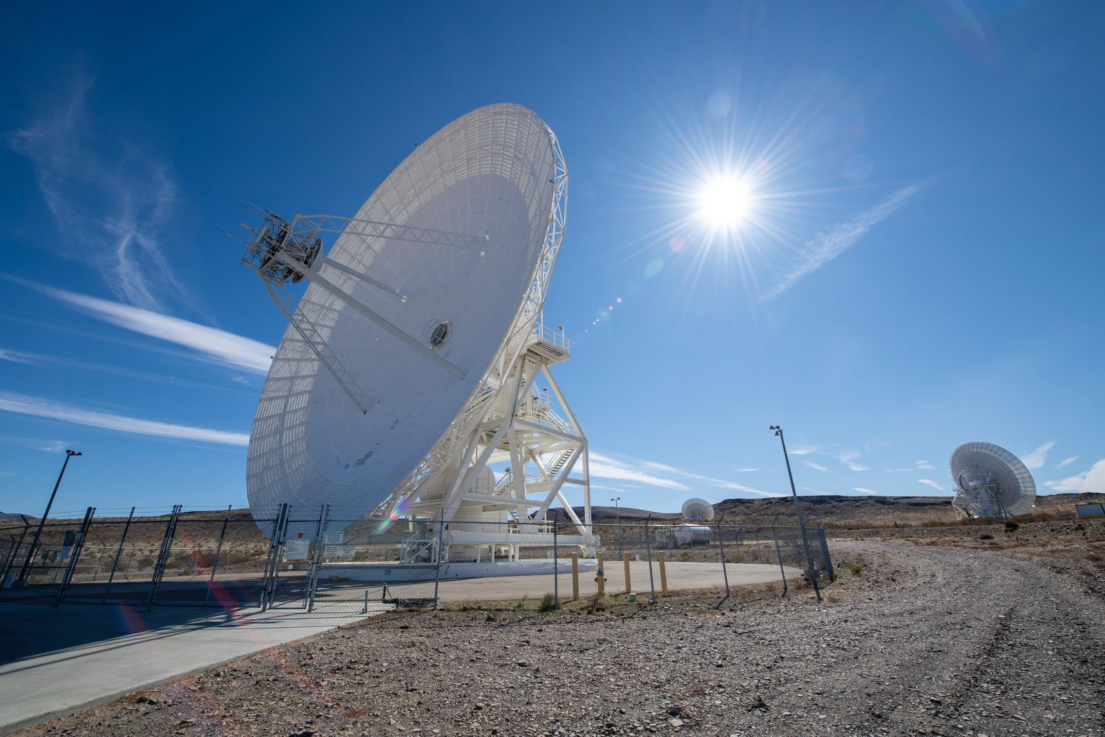 A giant dish antenna of the Deep Space Network