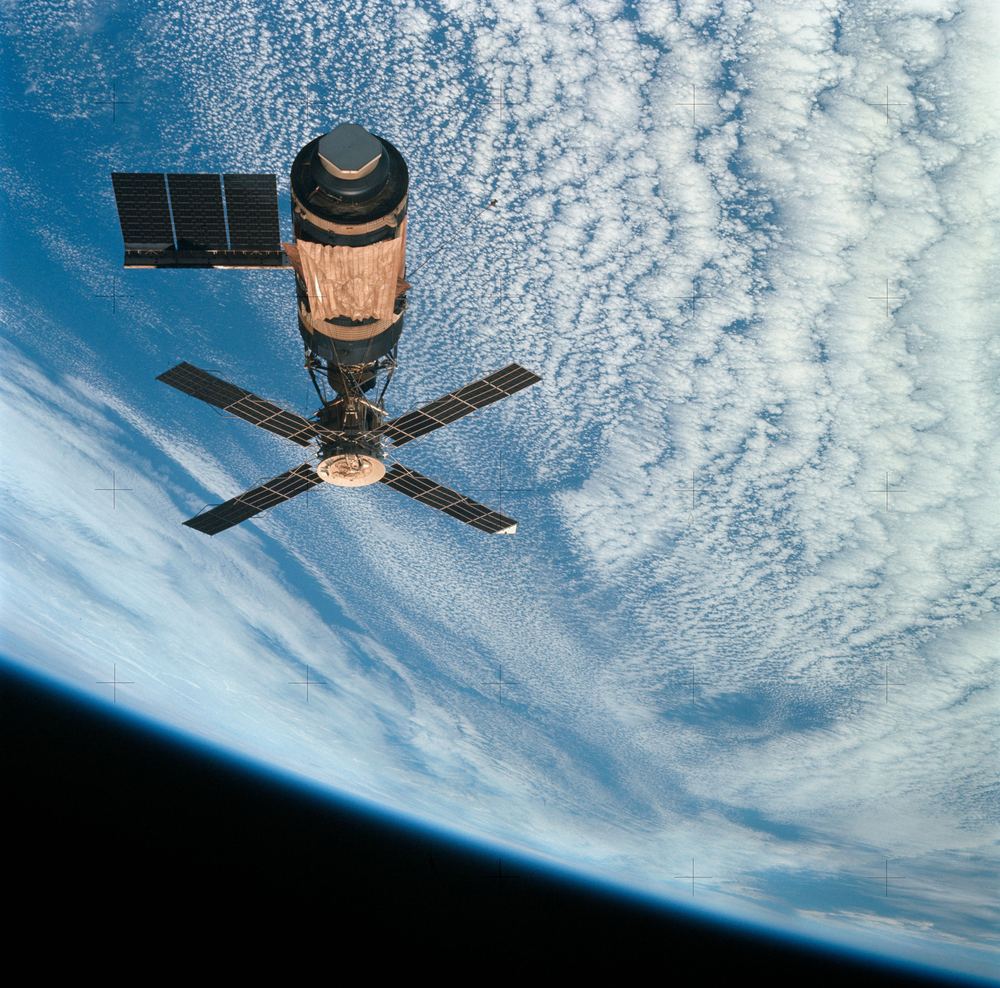 The Skylab space station in orbit against the Earth
